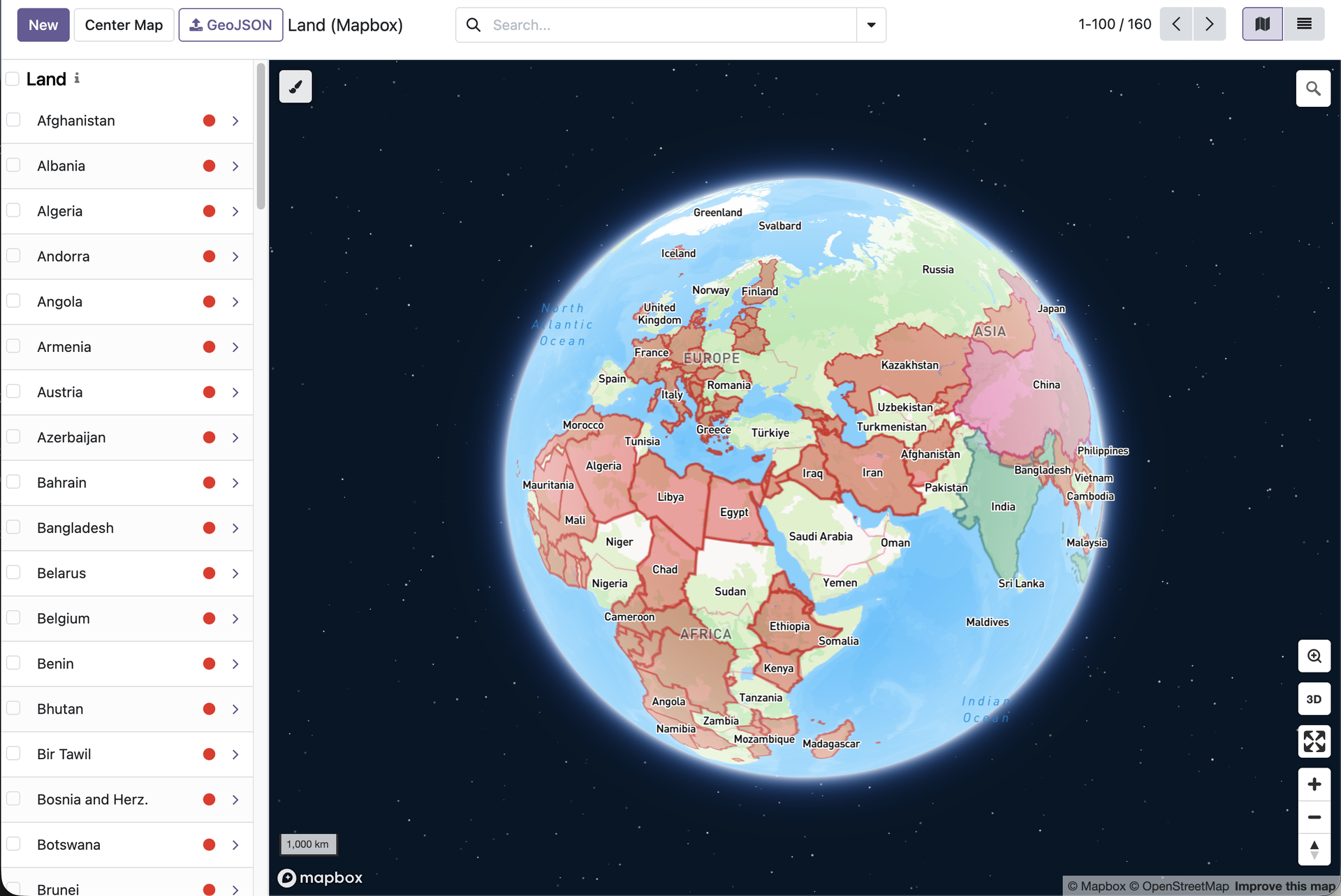 GeoJSON territories displayed as color-coded polygons on a Mapbox map